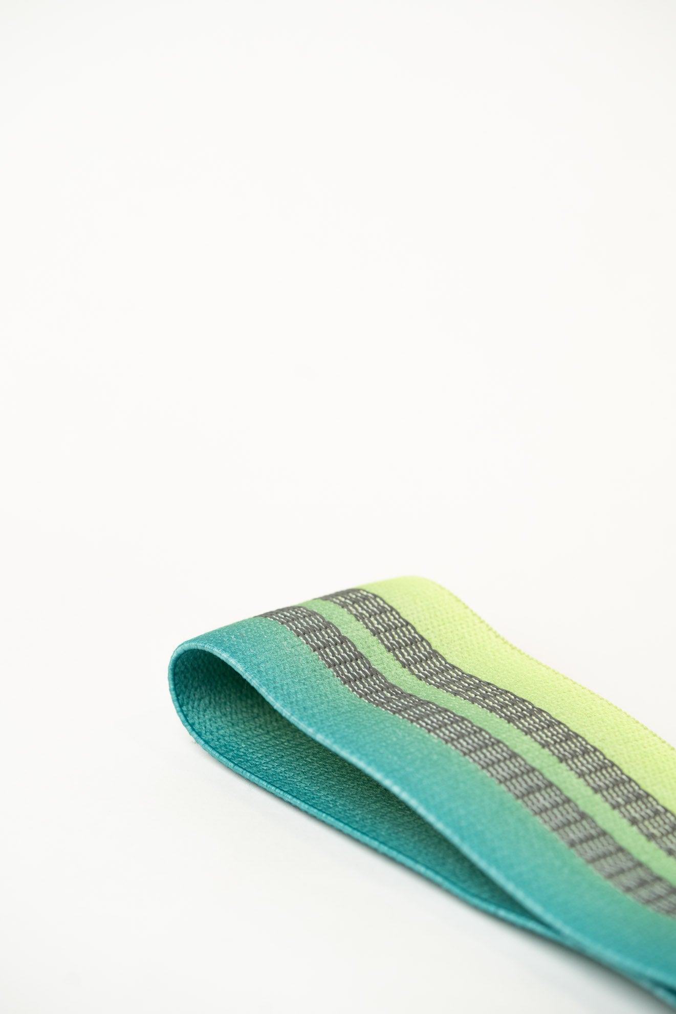 inside of uppper hip resistance band green ombre