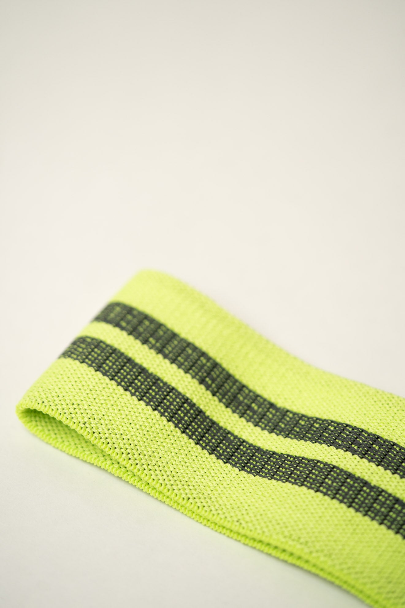 inside of uppper hip resistance band neon green
