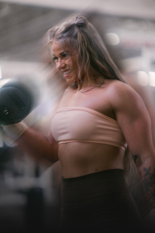 strong woman lifting weights