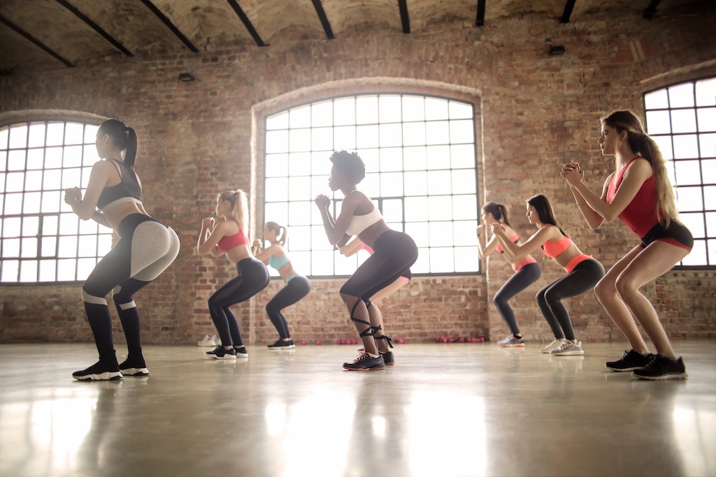 group of women doing a bodyweight workout