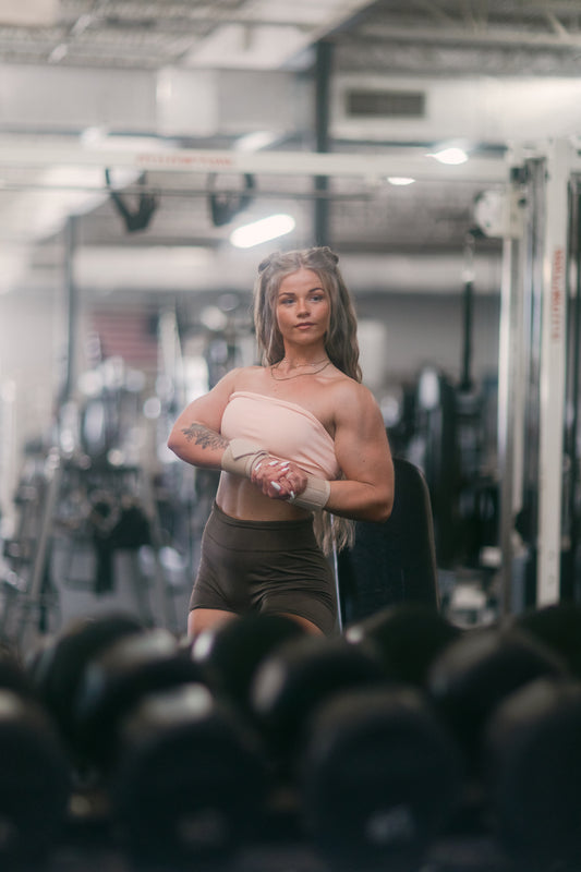 woman flexing triceps